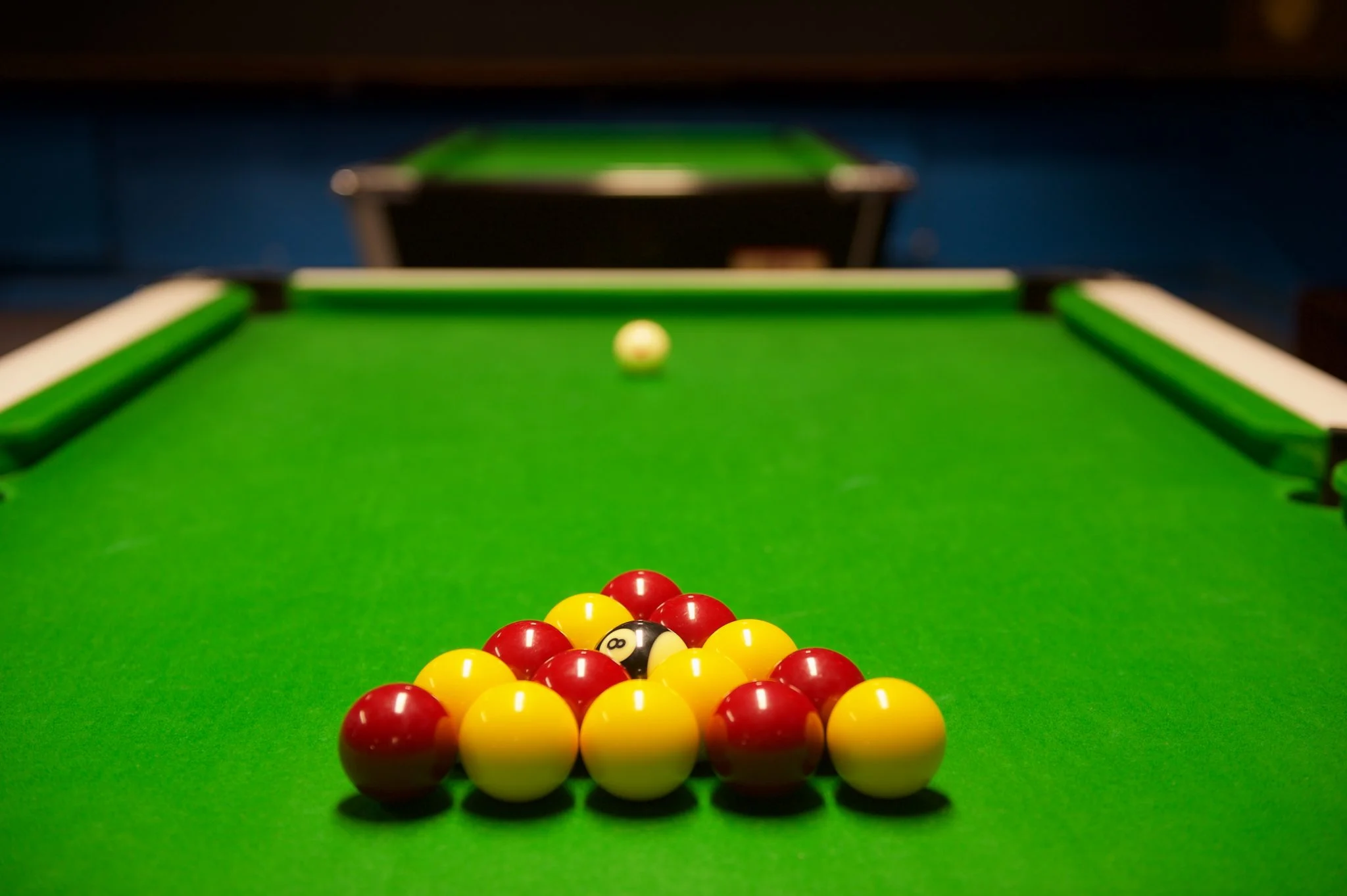 A freshly racked set of pool balls