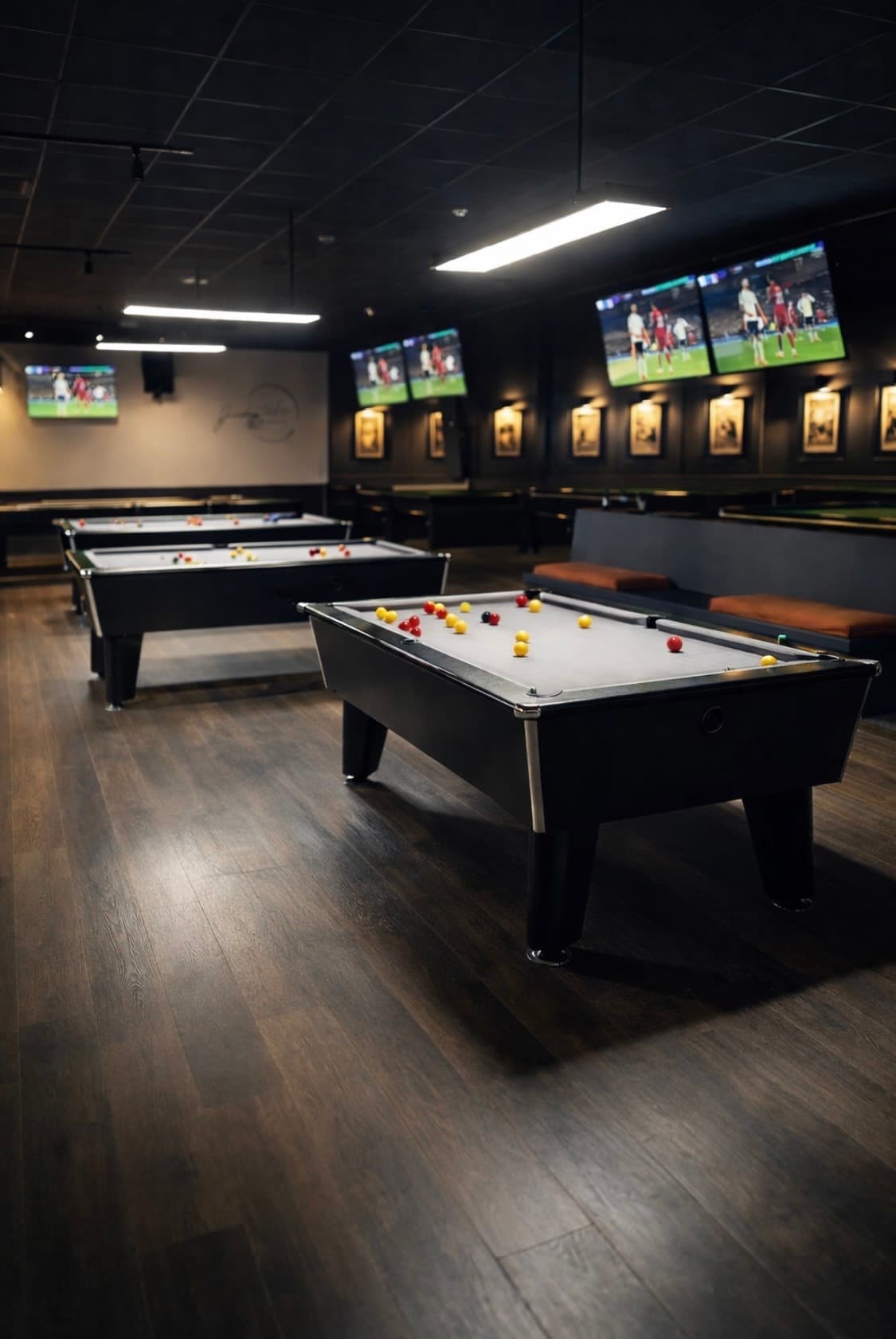The pool room with screens overhead